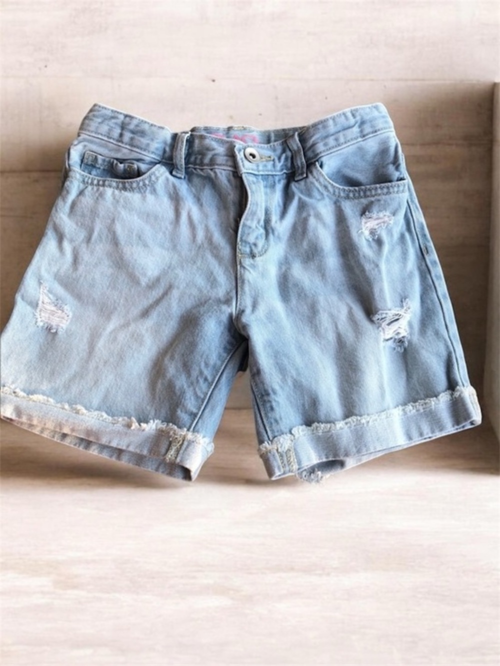 Distressed denim shorts